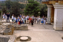 Greek Islands, CRETE, Iraklion, PALACE OF KNOSSOS, tour group at Great Proplyaea ruins, GIS1204JPL