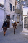 Greek Islands, CRETE, Kritsa, street scene with village woman and donkey, GIS1196JPL