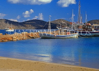 Greek Islands, CRETE, beach and fishing boats, near Elounda, GIS1259JPL