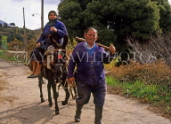 Greek Islands, CRETE, farmer and woman on donkey, GIS184JPL