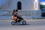 Greek Islands, MYKONOS, couple riding on a moped, GIS561JPL