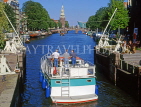 HOLLAND, Amsterdam, boat passing through Sint Antonius Sluis (lock), HOL625JPL