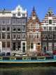 HOLLAND, Amsterdam, typical gabled architecture and houseboat, HOL661JPL
