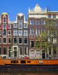 HOLLAND, Amsterdam, typical gabled architecture and houseboat, HOL688JPL