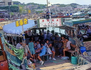HONG KONG, Cheung Chau Island, waterfront, people in water taxi, HK299JPL