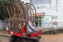 HONG KONG, Cheung Chau island, man driving his mini tractor, HK1576JPL