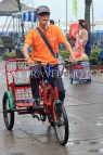 HONG KONG, Cheung Chau island, man riding hire tricycle, HK1577JPL