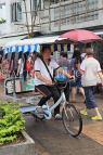 HONG KONG, Cheung Chau island, man riding hire tricycle, HK1579JPL