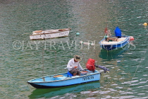 HONG KONG, Hong Kong Island, Stanley, fisherman in small boat, HK2269JPL