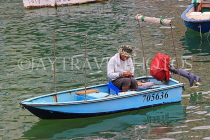 HONG KONG, Hong Kong Island, Stanley, fisherman in small boat, HK2270JPL