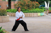 HONG KONG, Kowloon, Kowloon Park, woman practicing Tai Chi, HK1694JPL