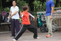 HONG KONG, Kowloon, Kowloon Park, woman practicing Tai Chi, HK1695JPL