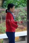 HONG KONG, Kowloon, Kowloon Park, woman practicing Tai Chi, HK1704JPL