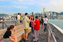 HONG KONG, Kowloon, Tsim Sha Tsui Promenade, people and HK Island skyline, HK1260JPL