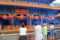 HONG KONG, Kowloon, Wong Tai Sin Temple, Main Altar, worshippers, incense sticks, HK1129PL