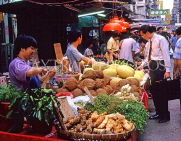 HONG KONG, Kowloon, market scene, stall with coconuts and gourds, HK281JPL