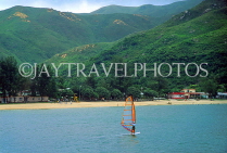 HONG KONG, Lantau Island, Silvermine Bay, coast, and windsurfer, HK529JPL
