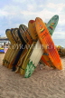 Hawaiian Islands, OAHU, Waikiki, surfboards stacked up on beach, HAW301JPL