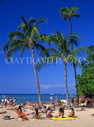 Hawaiian Islands, OAHU, Waikiki Beach, sunbathers and coconut trees, HAW312JPL