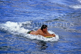 Hawaiian Islands, OAHU, Waikiki Beach, surfer riding a wave, HAW304JPL