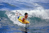 Hawaiian Islands, OAHU, Waikiki Beach, surfer riding a wave, HAW332JPL