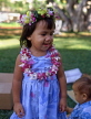 Hawaiian Islands, OAHU, little Hawaiian girl wearing orchid Lei, HAW100JPL