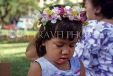 Hawaiian Islands, OAHU, little Hawaiian girl wearing orchid Lei, HAW229JPL