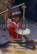 INDIA, Rajasthan, JAISALMER, market scene, boy with weighing scales, IND612JPL