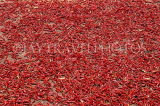 INDIA, South India, Karnataka, MYSORE, red chillies, drying by roadside, IND122JPL