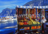 ITALY, Campania, Amalfi Coast, CAPRI, fruit stall, marina and mountain background, ITL957JPL