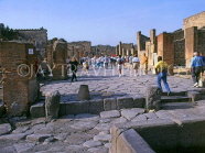 ITALY, Campania, POMPEII, ancient stone paved main street, tourists, ITL901JPL