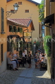 ITALY, Lombardy, Lake Como, BELLAGIO, narrow street and restaurant, ITL2189JPL