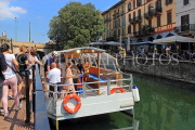 ITALY, Lombardy, MILAN, Naviglio Grande canal, cruise boat and tourists, ITL2048JPL