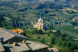 ITALY, Tuscany, MONTEPULCIANO, rooftops and San Biago church, ITL143JPL