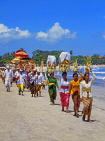 Indonesia, BALI, Kuta Beach, Melasti Festival procession, worshippers carrying offerings, BAL603JPL