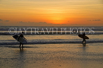 Indonesia, BALI, Kuta Beach, sunset, surfers walking along beach, BAL1267JPL