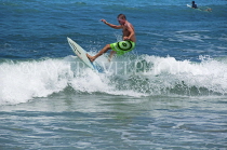 Indonesia, BALI, Kuta Beach, surfer riding the waves, BAL1265JPL