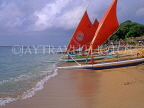 Indonesia, BALI, Sanur Beach, outrigger canoes (Jakung) lined up on beach, BAL996JPL