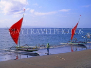 Indonesia, BALI, Sanur Beach, two outrigger canoes (Jakung) on beach, BAL1024JPL