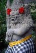 Indonesia, BALI, temple stone statue with kain polens cloth (symbol of good and evil), BAL1079JPL