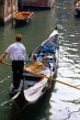 Italy, VENICE, Gondola cruising along canal, ITL1680JPL