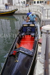 Italy, VENICE, Gondolier cleaning his boat, ITL1833JPL