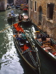 Italy, VENICE, canal scene with couple in gondoala, ITL1711JPL