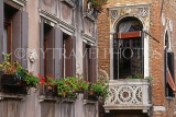 Italy, VENICE, canalside houses and balconies with flowers, ITL1855JPL