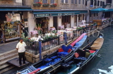 Italy, VENICE, canalside restaurant and gondolas, ITL1683JPL