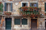 Italy, VENICE, house windows overflowing with flowers, ITL1854JPL