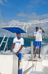 JAMAICA, Montego Bay, water sport boat, captain and helper, JM323JPL