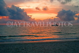 JAMAICA, Negril, 7 Mile Beach, sunset, with bat at sea, JM314JPL