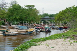 JAMAICA, Negril, fishing boats by riverside, JM386JPL
