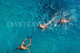JAMAICA, Negril, holidaysmakers enjoying a swim at sea, JM354JPL
